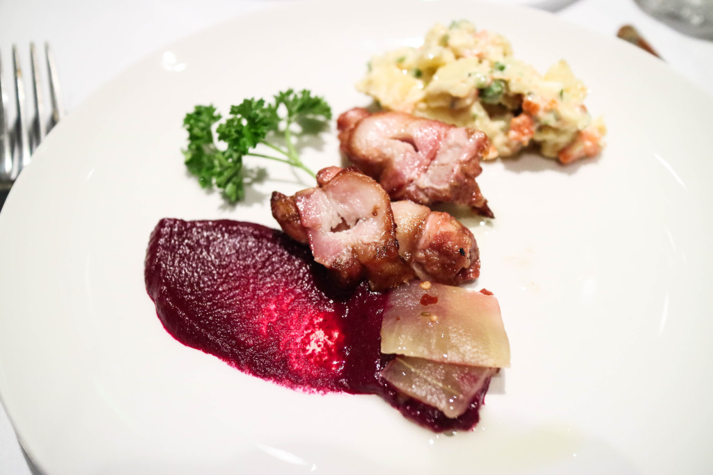 Bacon-wrapped chicken thigh with potato salad, watermelon pickles and charcoal-roasted beets at Pampa Brazilian Steakhouse, Calgary, Canada