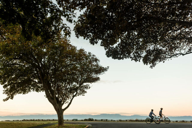 Biking along Dallas Road in Victoria