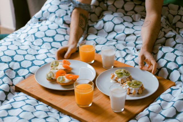 romantic idea for hotel room: have breakfast in bed